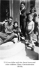 T/5 Vern Miller with his friend Anna, and other children 130-HQ