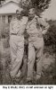 Ray E Shultz, 80-D, on left unknown on right