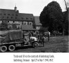 Trucks and GI's in the courtyard of Katlenburg Castle, Katlenburg, Germany, 88-E