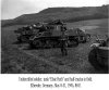 Unidentified soldier, tank, 'Elsie Ruth' and half-tracks in field. Ellierode, Germany, May 8-31, 1945, 88-E