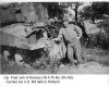 Cpl Fred Juhl, 18-A, and a burned out US M4 tank