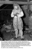 2 Mar 45 - T/5 George Weiner tries out protective clothes