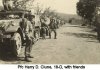 Pfc Harry D. Clune, 18-D, with friends