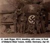 Lt. Jack Stype, 80-A, kneeling, in fromt of Melanie Elias' house