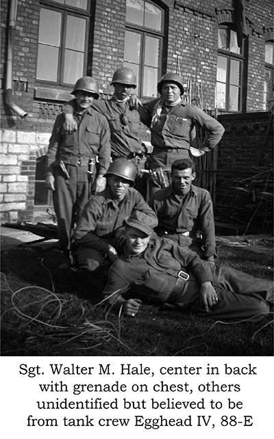 Sgt. Walter Hale, center with grenade, others unknown, believed to be crew of tank Egghead IV, 88-E