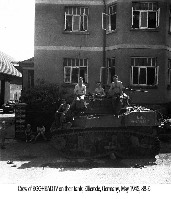 Crew of Egghead IV on their tank, Ellierode, Germany, May 1945, 88-E