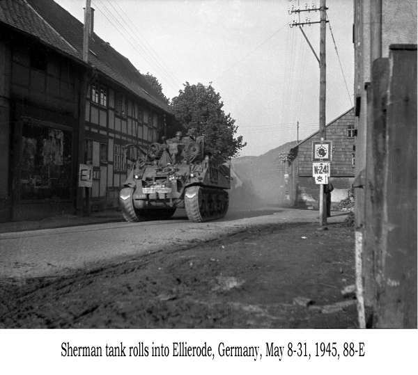 Sherman tank rolls into Ellierode Germany, May 8-31, 1945, 88-E