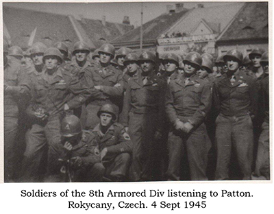 Troops listening to Patton at Rokycany, Czech, 4 Sept 45